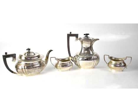 J. B. CHATTERLY &amp; SONS LTD; an Elizabeth II hallmarked silver four-piece tea service comprising coffee pot, teapot, twin-