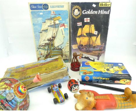 Various vintage toys to include a Thomas the Tank spinning wheel, a bendy Rupert the Bear dated 1969, a tinplate sports car, 