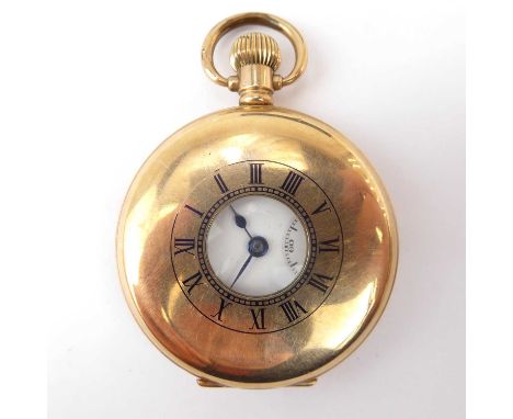 OMEGA; a gold plated demi hunter pocket watch, the white enamelled dial set with Roman numerals and smaller subsidiary dial, 