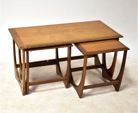 G-PLAN; an Astro teak nest of three tables.51 x 98 x 49cmThere are some deep scratches on the top, water marks, fading and ge