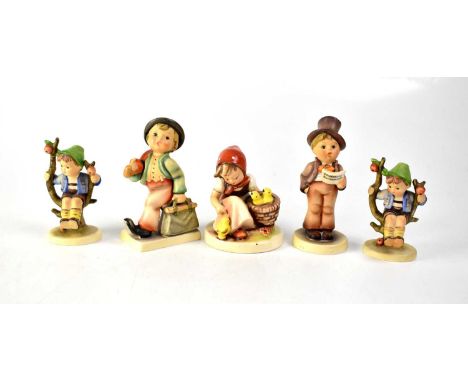 HUMMEL; five figures to include 'Feeding Feathered Friends', two boys on swings, carol singer, boy with umbrella etc.Qty: 5
