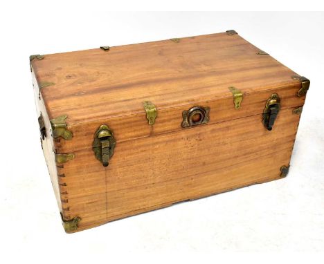 A vintage captain style pine travel trunk/chest with brass corners and straps and dovetail joints.43 x 88 x 53cm