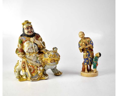 An early/mid-20th century Japanese model of a warrior with chrysanthemum, floral and abstract applied enamelled decoration, d