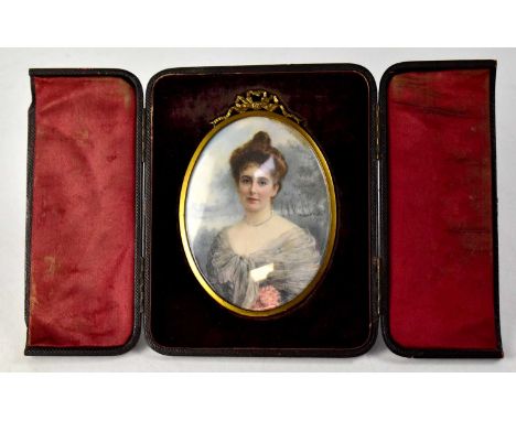 FLORENCE HANNAN (exhibited 1887-1906); a late 19th/early 20th century portrait miniature on ivory, depicting a young lady wit