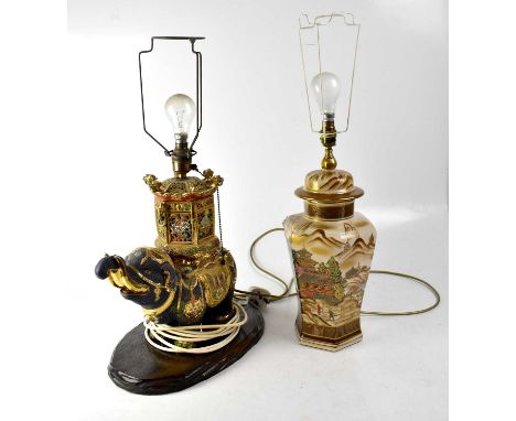 A 20th century Japanese Satsuma lamp base in the form of an elephant with a howdah on its back, forming the column of the lam