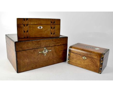 A mother of pearl inlaid burr walnut sewing box, 15 x 30 x 22cm, a further smaller burr walnut mother of pearl inlaid sewing 
