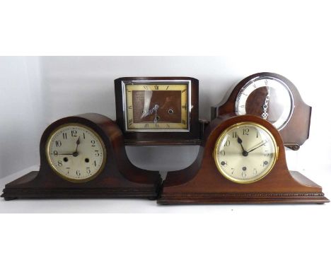 Four mantel clocks to include three oak cased examples comprising a Napoleon hat shape example, with chiming movement (lackin