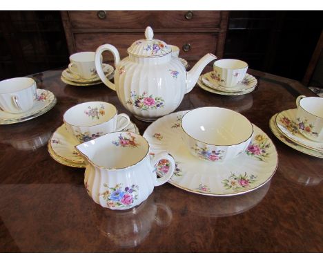 A Royal Worcester Roanoke teaset for six, white ground with floral sprays