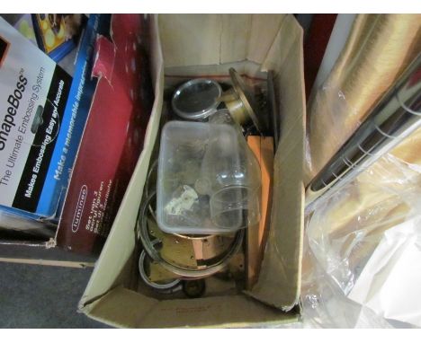 A box containing a clock and various clock parts