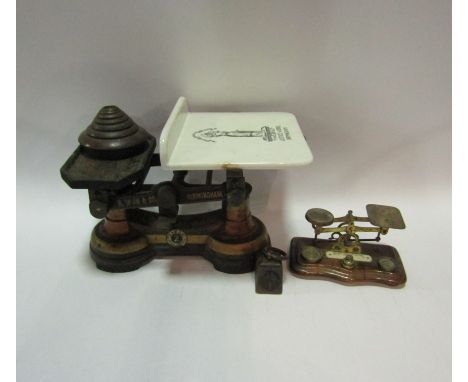 A set of H. Webb and Co. scales and weights and a set of postal scales