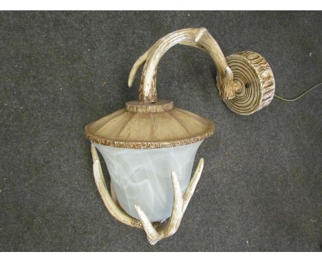 An antler effect wall bracket light with mottled glass shade, approx. 53cm tall x 46cm wide