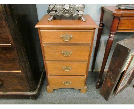 A Georgian revival walnut chest of four drawers on bracket feet, 78cm x 44cm x 32cm