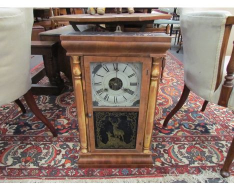 A Seth Thomas American ogee 30-hour wall clock with weights, pendulum and key