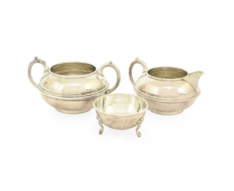 An Edward VII Silver Cream-Jug and Sugar-Bowl, by Samuel Walton Smith, London, 1901, each circular and with central reeded ba