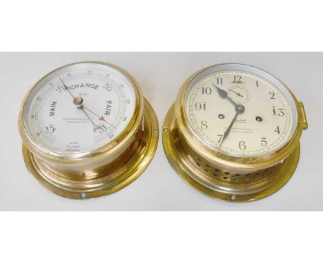 A Brass Ships Type Bulkhead Striking Clock, signed 'Sestrel', retailed by Henry Browne &amp; Son Ltd., Barking &amp; London, 