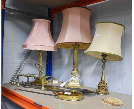 Two Brass Corinthian Column Table Lamps, a Victorian brass trivet, a further table lamp, an 18th century chestnut roaster and