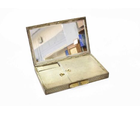 A George VI Parcel-Gilt Silver Minaudiere, by Ramsden and Roed, London, 1938, oblong and with parcel-gilt textured cover, the
