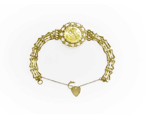 A Half Sovereign Bracelet, dated 1982 in a scalloped mount, to a 9 carat gold gate link bracelet, length 17.7cmGross weight 1