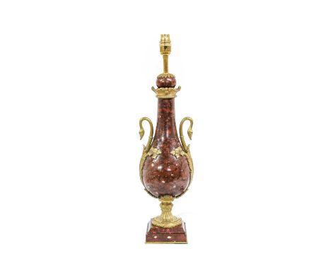 A Gilt Metal Mounted Variegated Rouge Marble Lamp Base, in Louis XVI style, of slender baluster form with swan neck handles, 