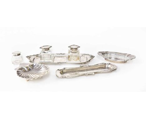 A Collection of Assorted Silver, including an oblong inkstand with foliage heightened rim and two silver-mounted glass bottle