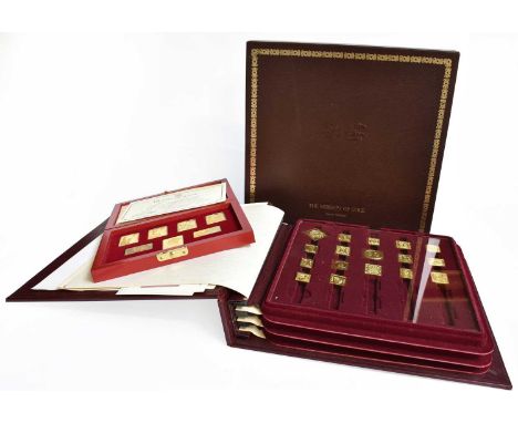 A Collection of Assorted Silver and Silver-Gilt Ingot and Medallion Sets, each in fitted case (qty)