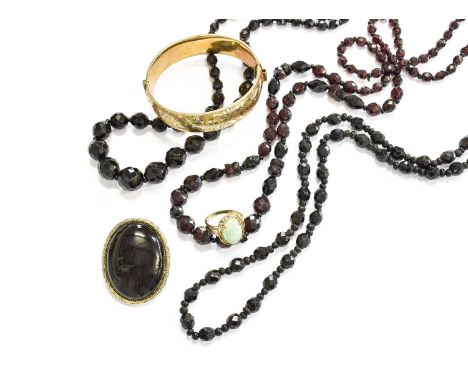 A Quantity of Jewellery, including a 9 carat gold jade ring, finger size O; a signet ring, out of shape; three beaded necklac