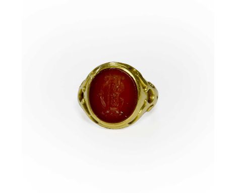 A Carnelian Intaglio Ring, the oval carnelian plaque engraved with initials, finger size H (approximately)The ring is unmarke