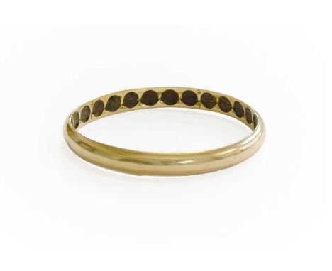 A Bangle, of yellow plain polished form, stamped '18K', inner diameter 6.4cmGross weight 13.8 grams.