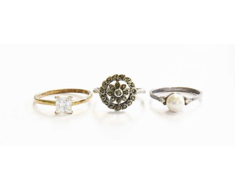 A Quantity of Silver and White Metal Rings, of varying designs and sizesGross weight 149.3 grams.