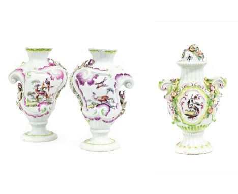 An Assembled Garniture Comprising: a Pair of Derby Porcelain Scroll Vases, circa 1765, in rococo style, painted with birds in