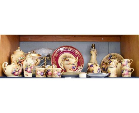 A Quantity of Aynsley Porcelain, decorated in the ''Orchard Gold'' pattern, including lamp, telephone, plates, tea wares etc.