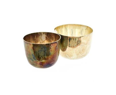 A George I or George II Silver Tumbler-Cup, London, Circa 1720, of typical form, repaired, 59mm diameter; Together With anoth
