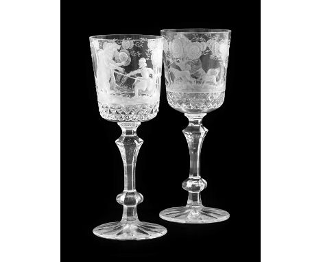 A Pair of Cut Glass Goblets, 20th century, the bucket-shaped bowls engraved with continuous bear hunting scenes on panelled b