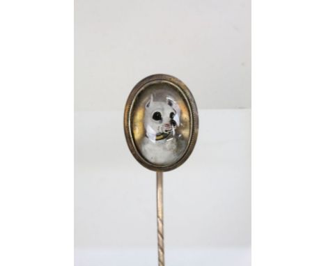 Victorian reverse painted intaglio yellow metal stick pin depicting a dog's head wearing a collar, rub over set with rope twi