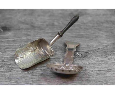 Victorian silver caddy spoon, fluted reeded stem, the scalloped bowl with repousse scroll decoration, makers Foxhall &amp; Co