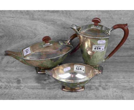 Art Deco three piece silver tea service comprising teapot, hot water pot and twin handled sugar bowl raised on rectangular st