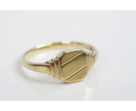 9ct yellow gold signet ring, the square head with textured decoration and stepped shoulders, ring size R