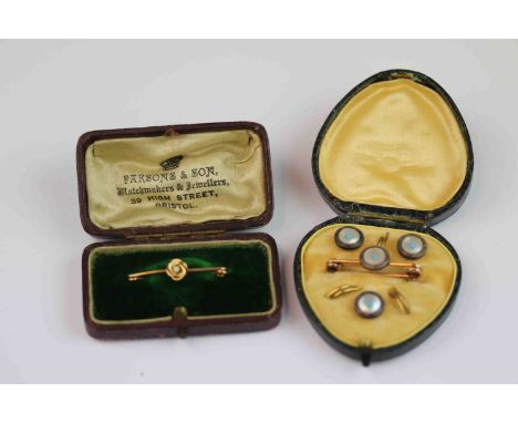 Mother-of-pearl and turquoise dress stud and tie pin set, cased together with an Edwardian seed pearl rose metal bar brooch, 