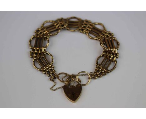 9ct yellow gold gate link style bracelet with padlock clasp and safety chain, width approximately 18mm