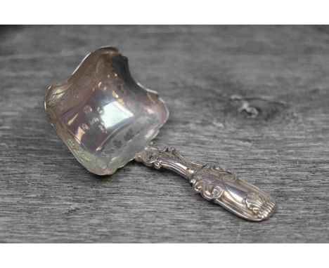 George III silver Kings Pattern caddy spoon, the stem with additional bright cut swag decoration, the pie crust border rectan