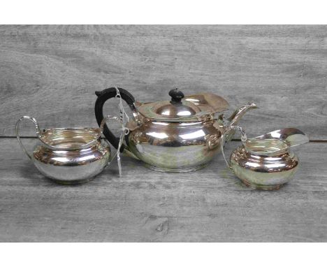 Edwardian silver three piece tea service comprising teapot, twin handled sugar bowl and milk jug, acanthus leaf decoration to