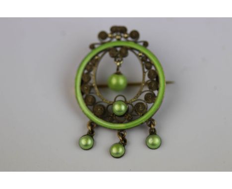 Marius Hammer: early 20th century Norwegian enamelled silver gilt filigree brooch of circular form with four enamelled pendan