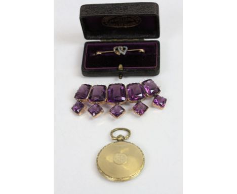 Victorian paste rose metal brooch modelled as a tiara, Victorian yellow metal fob with glazed panel and engine turned and cas