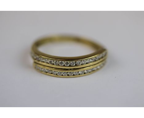 White stone 18ct yellow gold dress ring, two rows of channel set round mixed cut white stones, ring size R½