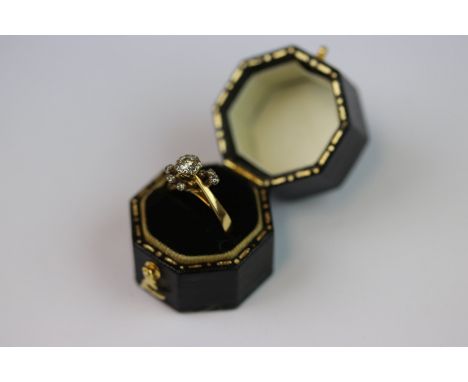 Diamond 18ct yellow gold modernist ring, the central round brilliant cut diamond weighing approximately 0.25 carat, illusion 