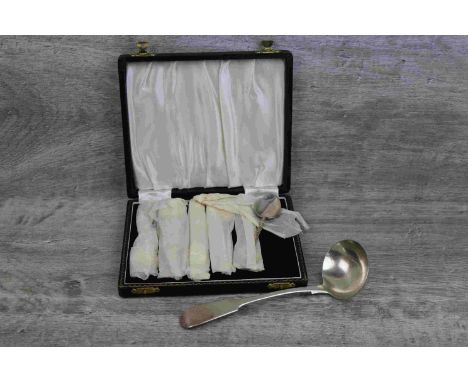 Cased set of six silver trefid teaspoons, knopped stem with floral and foliate decoration in relief, makers William Suckling 