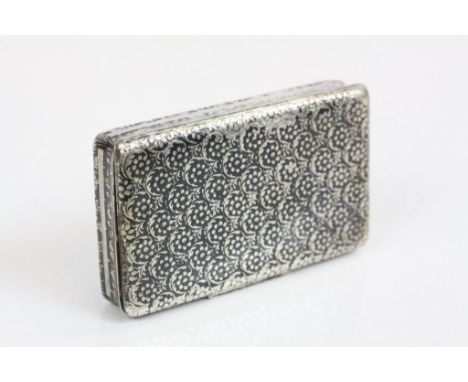 French 19th century silver and niello snuff box, floral and foliate decoration, hinged lid with thumb piece, gilt interior, s