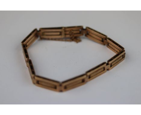 9ct rose gold stylised gate link bracelet, tongue and box snap clasp complete with safety chain, width approximately 6.5mm