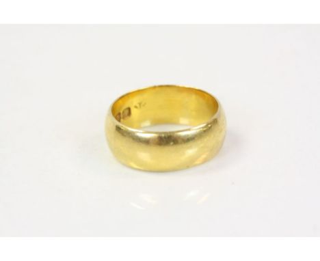 22ct yellow gold plain wedding band, width approximately 7mm, ring size K½