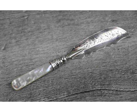 Scottish silver mother-of-pearl handled butter knife, the silver blade with bright cut floral and foliate decoration and wavy